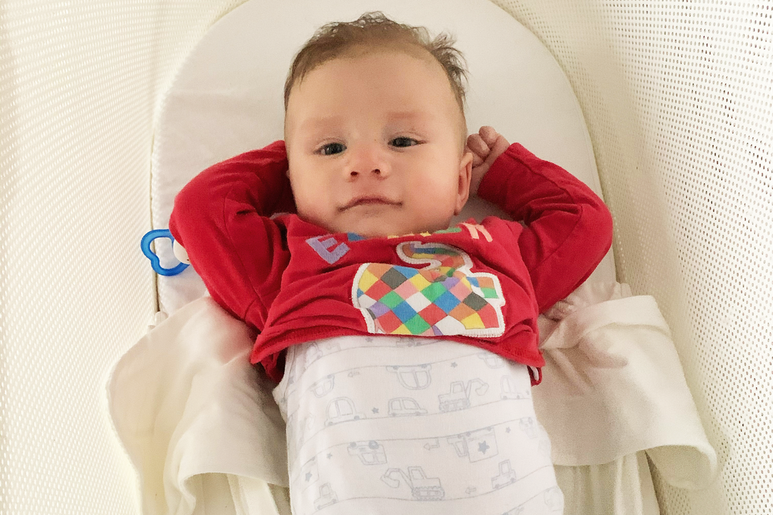 baby-stretching-in-snoo