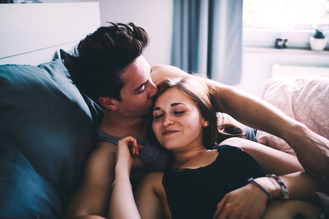 intimate-couple-in-bed