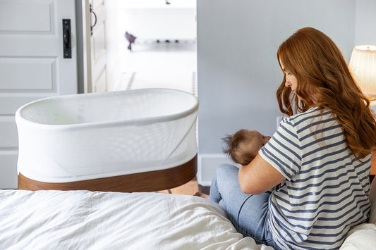 mom-holding-baby-with-snoo