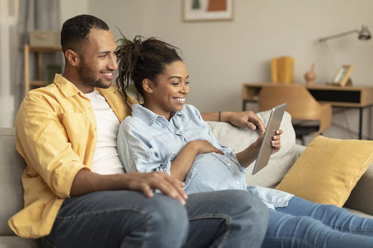 An expecting mum and dad shop on Amazon for baby gifts