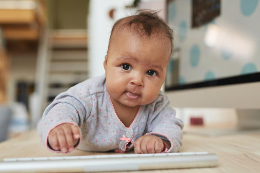 Baby girl attempts to crawl