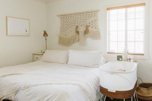 A peaceful adult room with a SNOO Smart Sleeper