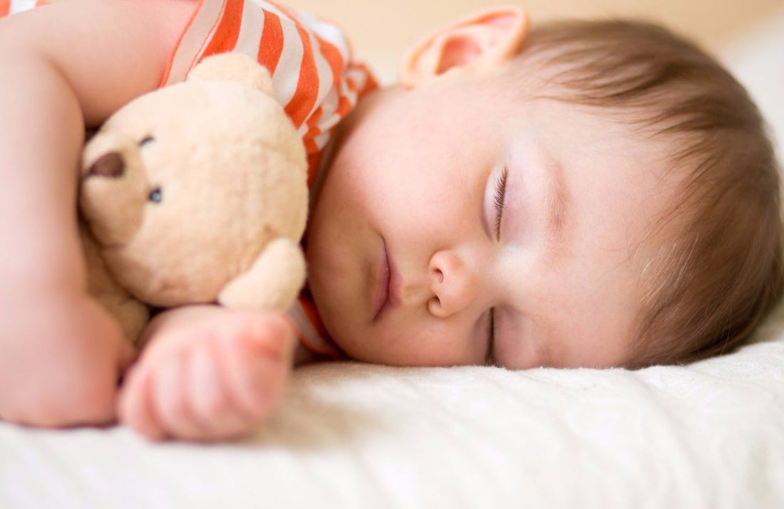 toddler-sleeping-with-teddy-bear