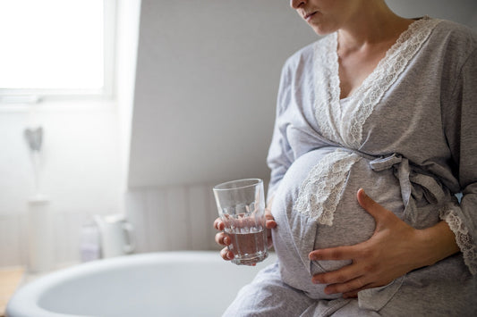 uncomfortable pregnant woman