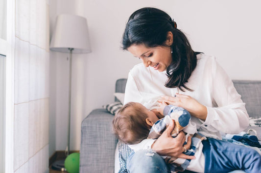 Mother breastfeeding baby