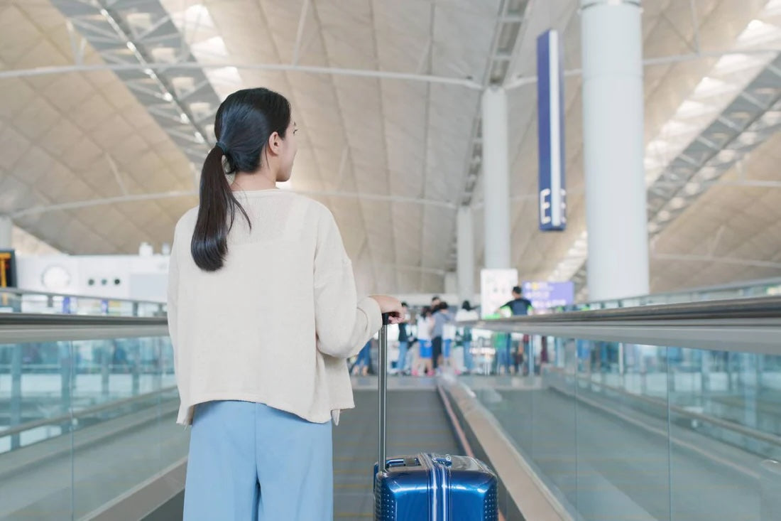 Pregnant woman traveling through the airport