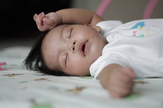 A sleeping 9-month-old baby